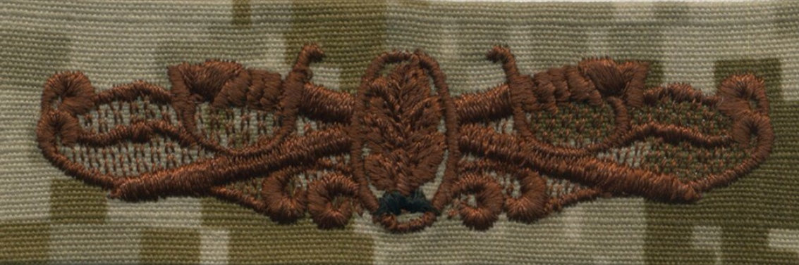 NWU Type II Warfare Devices & Breast Insignia Officer