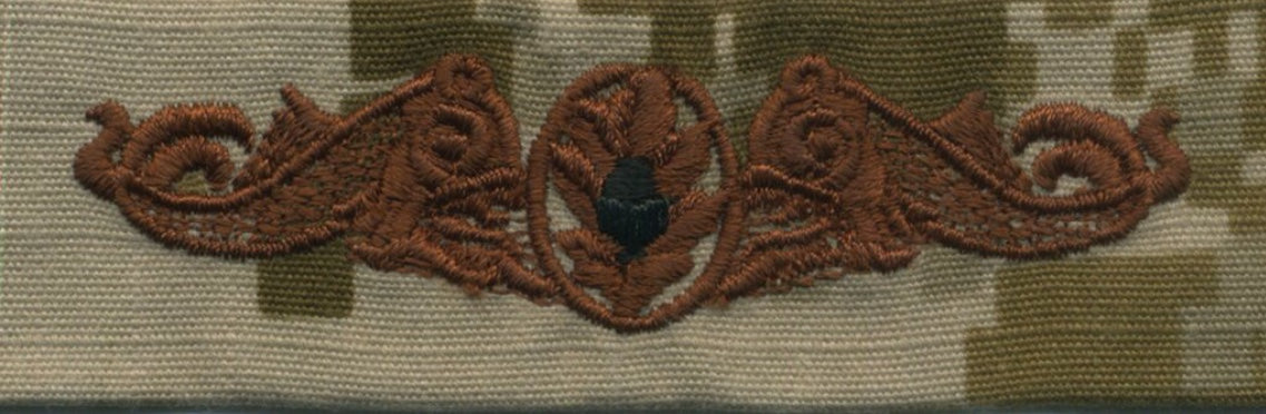 NWU Type II Warfare Devices & Breast Insignia Officer