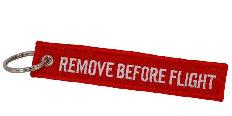 Remove before flight keychain