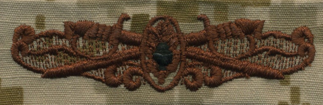 NWU Type II Warfare Devices & Breast Insignia Officer