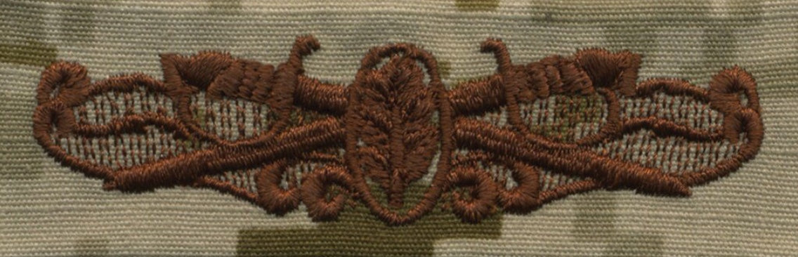 NWU Type II Warfare Devices & Breast Insignia Officer