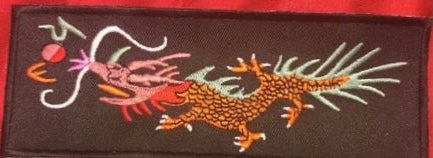 ORANGE BODY GREEN BACK FIREBALL DRAGON LIBERTY CUFF Single