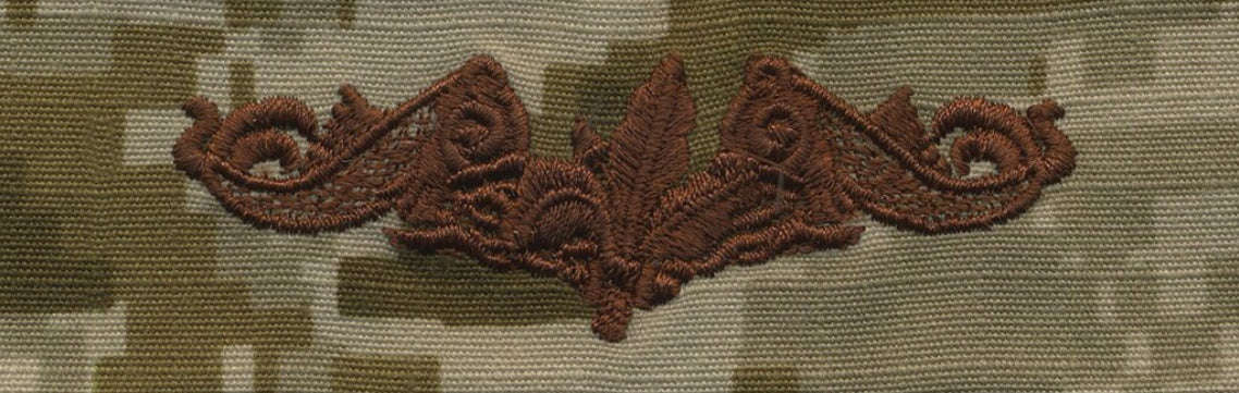 NWU Type II Warfare Devices & Breast Insignia Officer