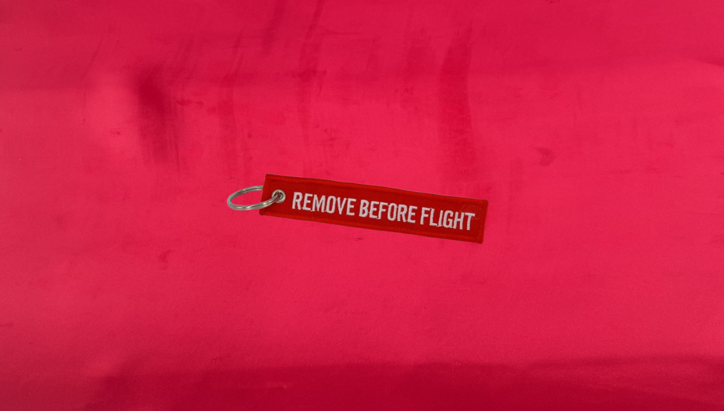 Remove Before Flight Keychain