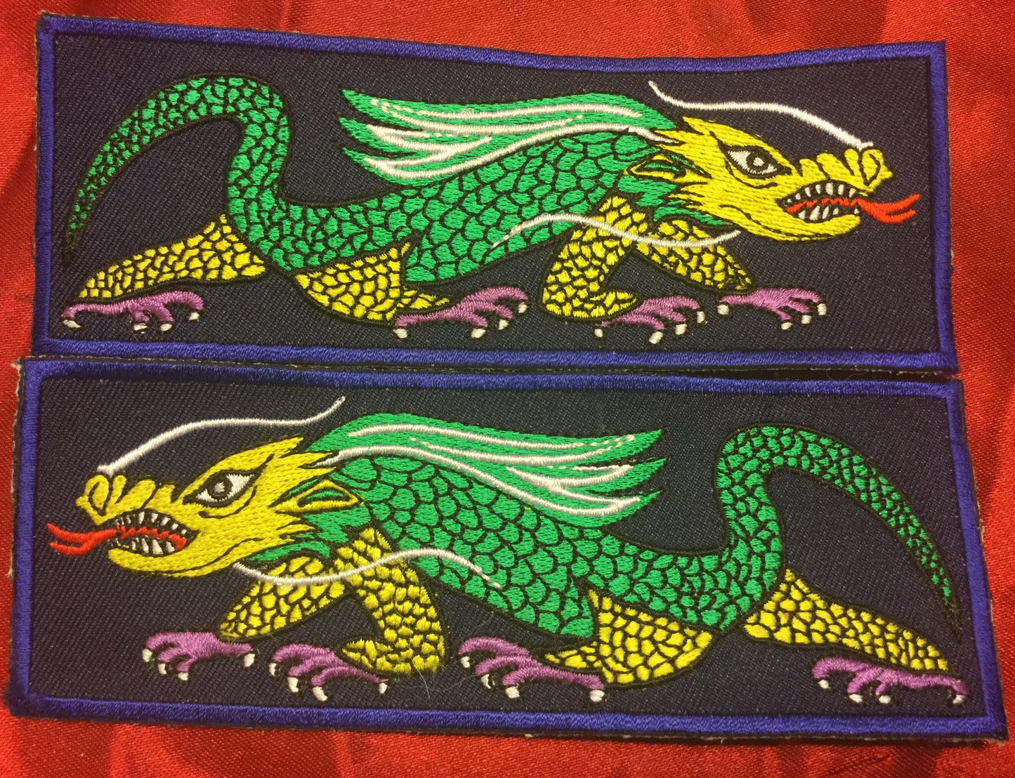 GREEN YELLOW AND PURPLE FOOT DRAGON LIBERTY CUFF SET.